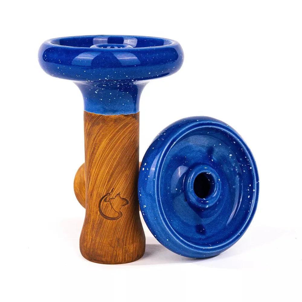 Dschinni Headshot Phunnel aus Ton mit der Glasurfarbe Blau überzogen. Es ist ein stehender und ein liegender Phunnel abgebildet. Das Dschinni Symbol ist zu sehen.